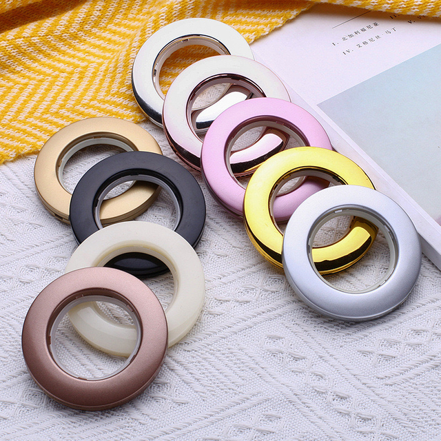 Stylish Modern Plastic Hotel And Home Curtain Ring Silent Perforated Art Hanging Roman Ring for Decorative Purpose